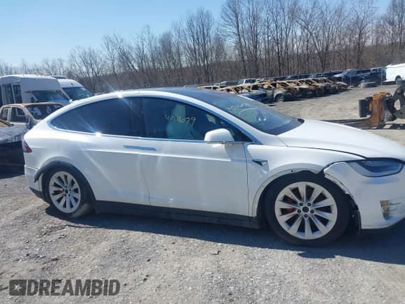 ✅ 2016 Tesla Model X P90D • VIN: 5YJXCAE46GF030106 • Lot: 41766079. Listed on IAAI with Not provided. Free auction sales archive from the USA and detailed vehicle history report at DreamBid. Image 12.