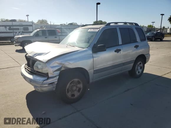✅ 2003 Suzuki Vitara • VIN: 2S3TE52V136105762 • Lot: 54796825. Listed on Copart with 164,564 mi. Free auction sales archive from the USA and detailed vehicle history report at DreamBid. Image 1.
