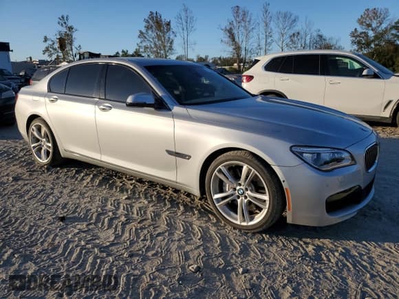 ✅ 2015 BMW 7 Series 750i • VIN: WBAYA8C53FGK19778 • Lot: 77258684. Listed on Copart with 34,535 mi. Free auction sales archive from the USA and detailed vehicle history report at DreamBid. Image 4.