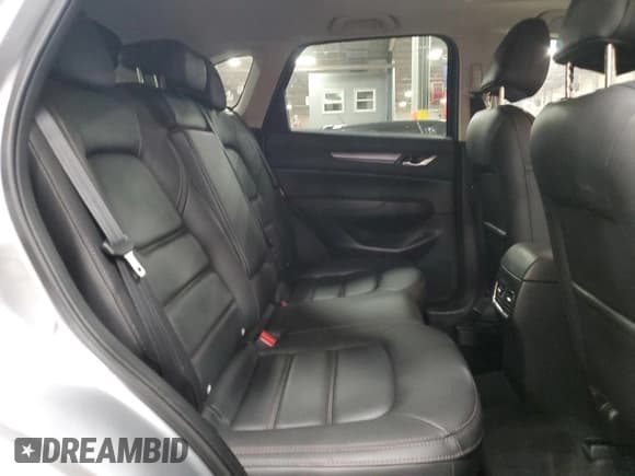 ✅ 2021 Mazda CX-5 Touring • VIN: JM3KFBCMXM0453623 • Lot: 90025385. Wystawiony na Copart z przebiegiem 83 246 mil. Bezpłatny archiwum sprzedaży aukcyjnych z USA i szczegółowy raport historii pojazdu na DreamBid. Zdjęcie 11.