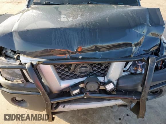 ✅ 2012 Nissan Xterra Pro-4X • VIN: 5N1AN0NW1CC511170 • Лот: 59260185. Опубликован ранее на Copart с пробегом 162 396 миль. Бесплатный доступ к архиву аукционных продаж из США и подробный отчёт об истории автомобиля на DreamBid. Изображение 11.