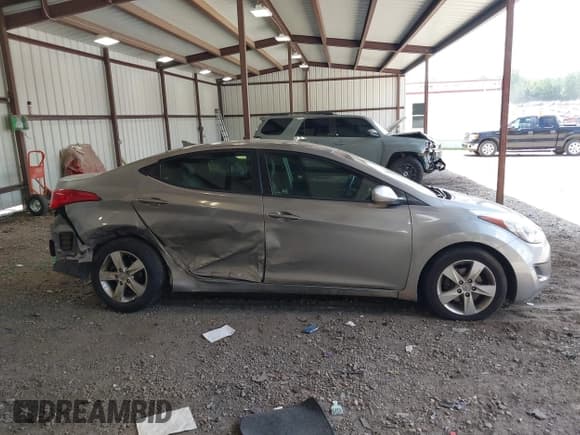 ✅ 2011 Hyundai Elantra GLS • VIN: KMHDH4AEXBU105809 • Lot: 42858512. Listed on IAAI with 121,891 mi. Free auction sales archive from the USA and detailed vehicle history report at DreamBid. Image 13.