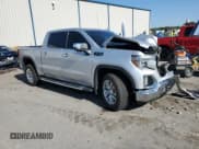 ✅ 2020 GMC Sierra 1500 SLT • VIN: 3GTU9DEDXLG313521 • Lot: 93219735. Listed on Copart with 61,775 mi. Free auction sales archive from the USA and detailed vehicle history report at DreamBid. Image 4.