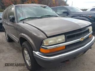 ✅ 2000 Chevrolet Blazer LT • VIN: 1GNDT13WXY2308038 • Lot: 43525363. Listed on IAAI with 134,618 mi. Free auction sales archive from the USA and detailed vehicle history report at DreamBid. Image 1.