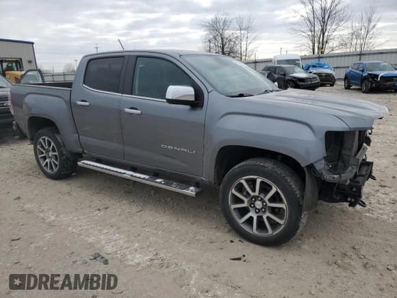 ✅ 2021 GMC Canyon 4WD Denali • VIN: 1GTG6EEN7M1151917 • Lot: 82189584. Listed on Copart with 55,898 mi. Free auction sales archive from the USA and detailed vehicle history report at DreamBid. Image 4.