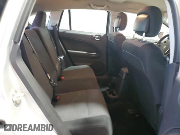 ✅ 2010 Dodge Caliber Mainstreet • VIN: 1B3CB3HA0AD599676 • Лот: 89916905. Опубликован ранее на Copart с пробегом 88 102 миль. Бесплатный доступ к архиву аукционных продаж из США и подробный отчёт об истории автомобиля на DreamBid. Изображение 11.