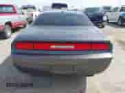 2014 Dodge Challenger SXT 100th Anniversary z VIN 2C3CDYAGXEH298415, wystawiony jako IAAI lot #42133602 z przebiegiem 126 523 mil mil oraz . Historia ofert i sprzedaży dostępna na DreamBid. Obrazek 16.