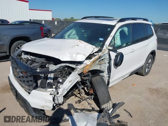 ✅ 2023 Honda Passport TrailSport • VIN: 5FNYF8H63PB017685 • Lot: 43421966. Listed on IAAI with 23,443 mi. Free auction sales archive from the USA and detailed vehicle history report at DreamBid. Image 2.