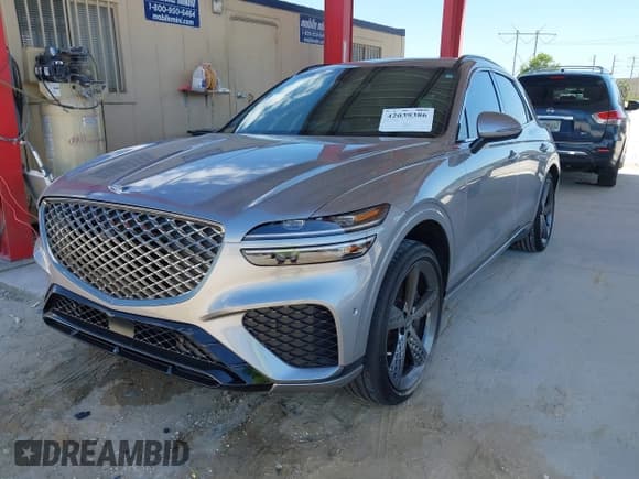 ✅ 2023 Genesis GV70 Sport • VIN: KMUMCDTC4PU098990 • Lot: 42039386. Wystawiony na IAAI z przebiegiem 32 090 mil. Bezpłatny archiwum sprzedaży aukcyjnych z USA i szczegółowy raport historii pojazdu na DreamBid. Zdjęcie 2.