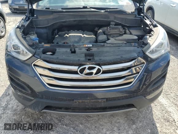✅ 2015 Hyundai Santa Fe • VIN: 5XYZTDLBXFG251775 • Лот: 59869124. Опубликован ранее на Copart с пробегом Не указан. Бесплатный доступ к архиву аукционных продаж из США и подробный отчёт об истории автомобиля на DreamBid. Изображение 12.