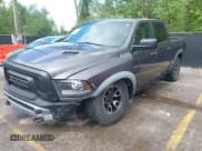 ✅ 2015 Ram 1500 Rebel • VIN: 1C6RR7YTXFS785507 • Lot: 42172925. Listed on IAAI with 100,201 mi. Free auction sales archive from the USA and detailed vehicle history report at DreamBid. Image 19.