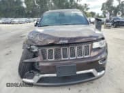 ✅ 2015 Jeep Grand Cherokee Summit • VIN: 1C4RJFJM3FC619305 • Lot: 83767445. Listed on Copart with 192,761 mi. Free auction sales archive from the USA and detailed vehicle history report at DreamBid. Image 5.