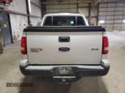 ✅ 2010 Ford Explorer Sport Trac XLT • VIN: 1FMEU5BE5AUF03013 • Лот: 67212825. Опубликован ранее на Copart с пробегом 129 668 миль. Бесплатный доступ к архиву аукционных продаж из США и подробный отчёт об истории автомобиля на DreamBid. Изображение 6.