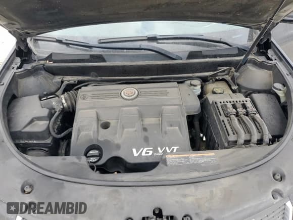 ✅ 2012 Cadillac SRX Performance Collection • VIN: 3GYFNEE39CS594753 • Lot: 92873555. Listed on Copart with 151,617 mi. Free auction sales archive from the USA and detailed vehicle history report at DreamBid. Image 12.