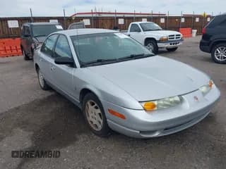 ✅ 2002 Saturn SL • VIN: 1G8ZK52712Z234973 • Lot: 43263075. Listed on IAAI with 153,198 mi. Free auction sales archive from the USA and detailed vehicle history report at DreamBid. Image 1.