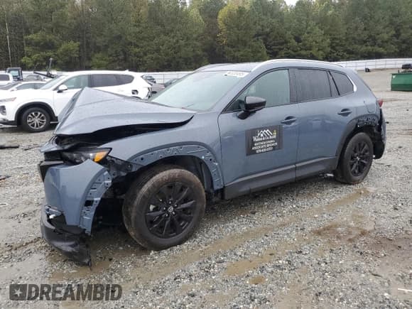 ✅ 2023 Mazda CX-50 S Preferred Plus • VIN: 7MMVABCM9PN112757 • Lot: 90320495. Listed on Copart with 57,072 mi. Free auction sales archive from the USA and detailed vehicle history report at DreamBid. Image 1.