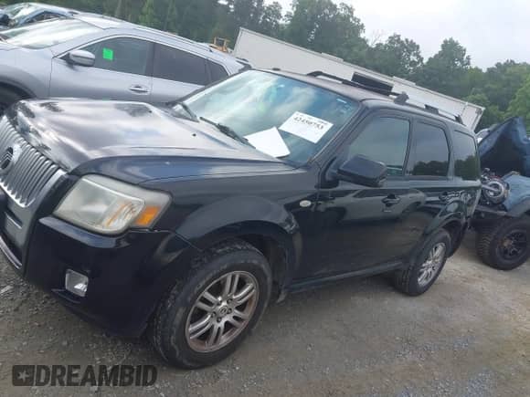 2009 Mercury Mariner Premier with VIN 4M2CU97749KJ15320, listed as a IAAI auction lot 42450753 with 182,172 mi miles and . Bid and sale history available at DreamBid. Image 14.