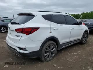 ✅ 2017 Hyundai Santa Fe Ultimate • VIN: 5XYZWDLA1HG420292 • Лот: 54267354. Опубликован ранее на Copart с пробегом 94 436 миль. Бесплатный доступ к архиву аукционных продаж из США и подробный отчёт об истории автомобиля на DreamBid. Изображение 3.