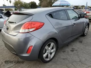 ✅ 2014 Hyundai Veloster • VIN: KMHTC6AD2EU217571 • Lot: 84044224. Listed on Copart with 137,609 mi. Free auction sales archive from the USA and detailed vehicle history report at DreamBid. Image 3.