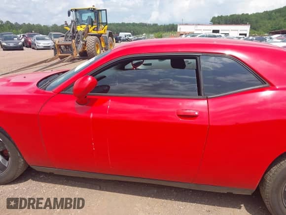 2014 Dodge Challenger SXT 100th Anniversary with VIN 2C3CDYAG0EH285477, listed as a IAAI auction lot 42298675 with 128,684 mi miles and . Bid and sale history available at DreamBid. Image 14.