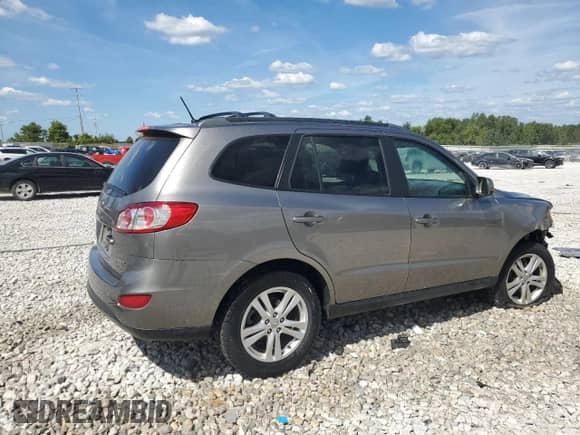 ✅ 2012 Hyundai Santa Fe SE • VIN: 5XYZHDAG1CG110640 • Lot: 70302985. Listed on Copart with 187,049 mi miles. Access the free auction sales archive from the USA and view a detailed vehicle history report at DreamBid. Image 3.