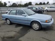 ✅ 1990 Toyota Camry • VIN: JT2VV22EXL3011563 • Lot: 46136565. Wystawiony na Copart z przebiegiem 63 819 mil. Bezpłatny archiwum sprzedaży aukcyjnych z USA i szczegółowy raport historii pojazdu na DreamBid. Zdjęcie 4.