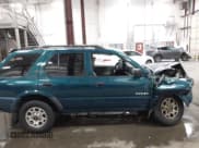 ✅ 1998 Isuzu Rodeo S • VIN: 4S2CK58W4W4337404 • Lot: 43075464. Listed on IAAI with 235,177 mi. Free auction sales archive from the USA and detailed vehicle history report at DreamBid. Image 13.