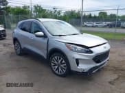 ✅ 2020 Ford Escape Titanium • VIN: 1FMCU9J99LUB45758 • Lot: 42286143. Listed on IAAI with 51,177 mi. Free auction sales archive from the USA and detailed vehicle history report at DreamBid. Image 1.