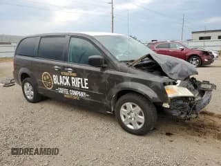 ✅ 2009 Dodge Caravan • VIN: 2D8HN11E09R682984 • Lot: 71401844. Listed on Copart with 58,819 mi. Free auction sales archive from the USA and detailed vehicle history report at DreamBid. Image 4.