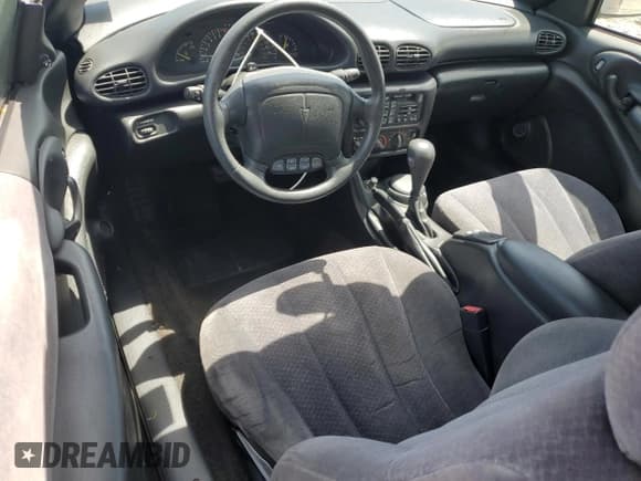 ✅ 1998 Pontiac Sunfire • VIN: 4G2JB32T1WB201350 • Lot: 53074805. Listed on Copart with 128,486 mi. Free auction sales archive from the USA and detailed vehicle history report at DreamBid. Image 8.