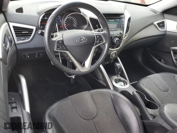 ✅ 2012 Hyundai Veloster w/Red Int • VIN: KMHTC6AD8CU053417 • Lot: 74477404. Wystawiony na Copart z przebiegiem 82 254 mil. Bezpłatny archiwum sprzedaży aukcyjnych z USA i szczegółowy raport historii pojazdu na DreamBid. Zdjęcie 8.