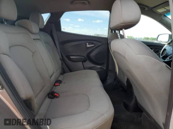 2013 Hyundai Tucson GL z VIN KM8JT3AB5DU654984, wystawiony jako Copart lot #72258644 z przebiegiem 123 394 mil mil oraz Szkoda całkowita • Salvage title. Historia ofert i sprzedaży dostępna na DreamBid. Obrazek 11.