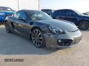 ✅ 2014 Porsche Cayman S • VIN: WP0AB2A88EK190575 • Lot: 43089971. Listed on IAAI with 20,946 mi. Free auction sales archive from the USA and detailed vehicle history report at DreamBid. Image 1.