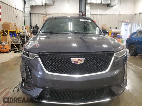 ✅ 2021 Cadillac XT6 Sport • VIN: 1GYKPHRS6MZ208757 • Lot: 64777955. Listed on Copart with 64,370 mi. Free auction sales archive from the USA and detailed vehicle history report at DreamBid. Image 5.