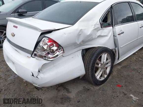 ✅ 2014 Chevrolet Impala LTZ • VIN: 2G1WC5E33E1167345 • Lot: 43548449. Listed on IAAI with 222,330 mi. Free auction sales archive from the USA and detailed vehicle history report at DreamBid. Image 6.