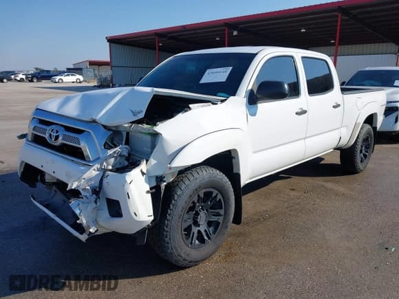 ✅ 2015 Toyota Tacoma PreRunner • VIN: 5TFKU4HN6FX006874 • Lot: 43090148. Listed on IAAI with 182,527 mi. Free auction sales archive from the USA and detailed vehicle history report at DreamBid. Image 2.