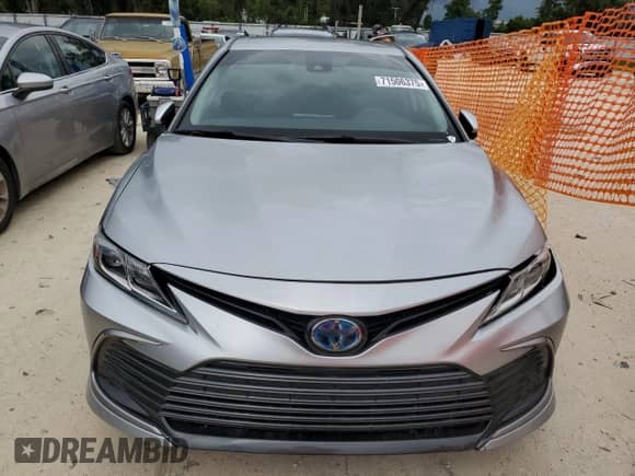 2021 Toyota Camry Hybrid LE with VIN 4T1C31AK7MU562031, listed as a Copart auction lot 71506375 with 82,877 mi miles and Salvage title. Bid and sale history available at DreamBid. Image 5.