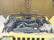 ✅ 2000 Jeep Wrangler Sport • VIN: 1J4FA49S2YP735627 • Lot: 43649472. Listed on IAAI with 140,099 mi. Free auction sales archive from the USA and detailed vehicle history report at DreamBid. Image 10.