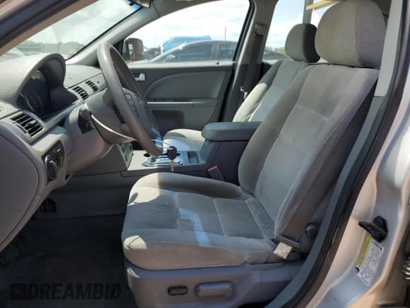 ✅ 2005 Ford Five Hundred SE • VIN: 1FAFP23125G117489 • Lot: 66215175. Wystawiony na Copart z przebiegiem 271 185 mil. Bezpłatny archiwum sprzedaży aukcyjnych z USA i szczegółowy raport historii pojazdu na DreamBid. Zdjęcie 7.