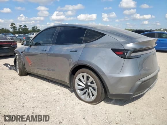 ✅ 2026 Tesla Model Y Long Range Launch Series • VIN: 7SAYGDEE0TA383390 • Лот: 84820235. Опубликован ранее на Copart с пробегом 6 284 миль. Бесплатный доступ к архиву аукционных продаж из США и подробный отчёт об истории автомобиля на DreamBid. Изображение 2.