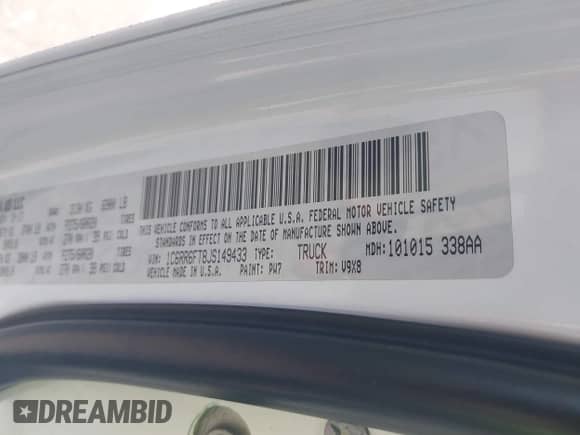 2018 Ram 1500 Tradesman z VIN 1C6RR6FT8JS149433, wystawiony jako IAAI lot #42332005 z przebiegiem 68 531 mil mil oraz . Historia ofert i sprzedaży dostępna na DreamBid. Obrazek 9.