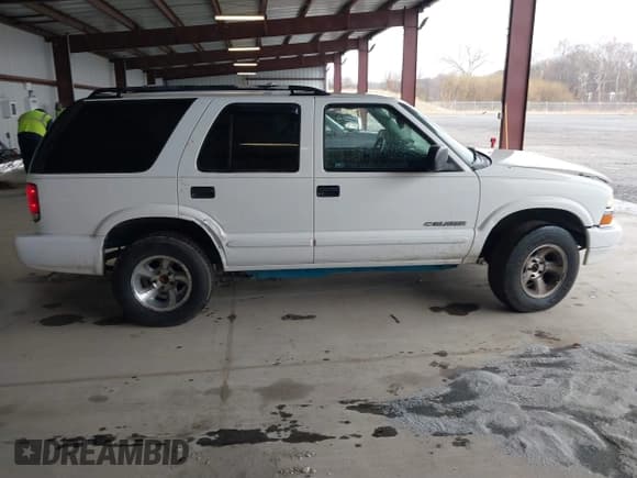 ✅ 2004 Chevrolet Blazer LS • VIN: 1GNDT13X64K129093 • Lot: 41860109. Wystawiony na IAAI z przebiegiem 175 588 mil. Bezpłatny archiwum sprzedaży aukcyjnych z USA i szczegółowy raport historii pojazdu na DreamBid. Zdjęcie 13.