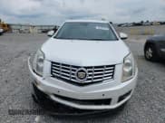 ✅ 2016 Cadillac SRX Premium Collection • VIN: 3GYFNDE39GS546265 • Lot: 65597945. Wystawiony na Copart z przebiegiem 145 591 mil. Bezpłatny archiwum sprzedaży aukcyjnych z USA i szczegółowy raport historii pojazdu na DreamBid. Zdjęcie 5.