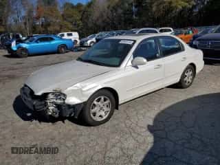 2001 Hyundai Sonata GLS with VIN KMHWF35V11A474934, listed as a Copart auction lot 83633174 with 127,176 mi miles and Clean title. Bid and sale history available at DreamBid. Image 1.