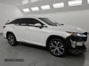 ✅ 2022 Lexus RX 350L • VIN: JTJHZKFA7N2038984 • Lot: 91164395. Wystawiony na Copart z przebiegiem 67 180 mil. Bezpłatny archiwum sprzedaży aukcyjnych z USA i szczegółowy raport historii pojazdu na DreamBid. Zdjęcie 4.