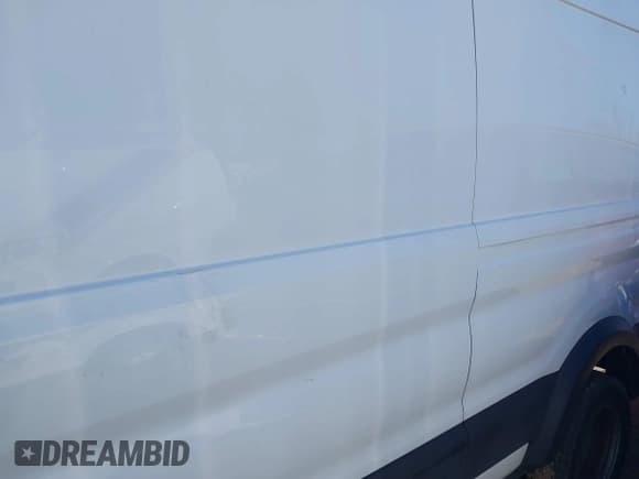 ✅ 2019 Ford Transit Cargo • VIN: 1FTBF4XG4KKB77790 • Лот: 41711746. Опубликован ранее на IAAI с пробегом 198 739 миль. Бесплатный доступ к архиву аукционных продаж из США и подробный отчёт об истории автомобиля на DreamBid. Изображение 6.