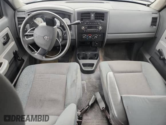 2005 Dodge Dakota ST с VIN 1D7HW28K45S236624, выставлен на аукционе Copart как лот 68104745 с пробегом 251 431 миль миль и Списание • Salvage title. История ставок и продаж доступна на DreamBid. Изображение 8.