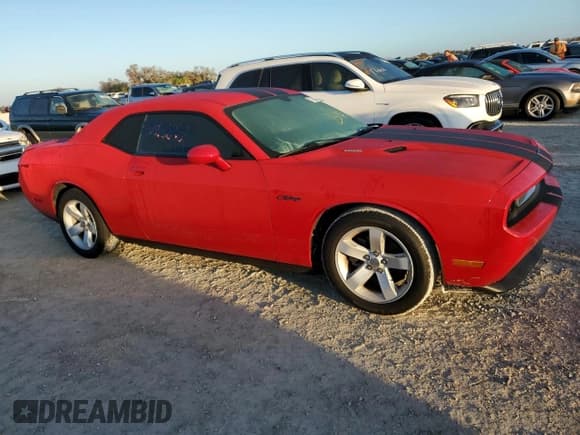 ✅ 2012 Dodge Challenger SXT • VIN: 2C3CDYAG1CH294282 • Lot: 77156864. Wystawiony na Copart z przebiegiem 28 042 mil. Bezpłatny archiwum sprzedaży aukcyjnych z USA i szczegółowy raport historii pojazdu na DreamBid. Zdjęcie 4.