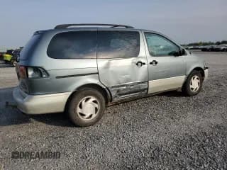 ✅ 1998 Toyota Sienna LE • VIN: 4T3ZF13C7WU074909 • Lot: 72345864. Listed on Copart with 452,598 mi. Free auction sales archive from the USA and detailed vehicle history report at DreamBid. Image 3.