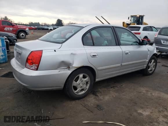 2004 Hyundai Elantra GLS with VIN KMHDN46D74U788645, listed as a Copart auction lot 57315104 with 296,563 mi miles and Salvage title. Bid and sale history available at DreamBid. Image 3.